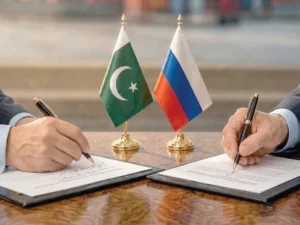 Russian and Pakistani flags overlaid on a commercial shipping port background representing bilateral trade frontiers.